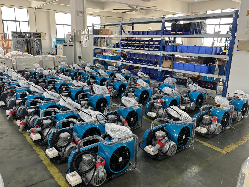 unpacked BUENAIR compressors prepared for inspection in workshop